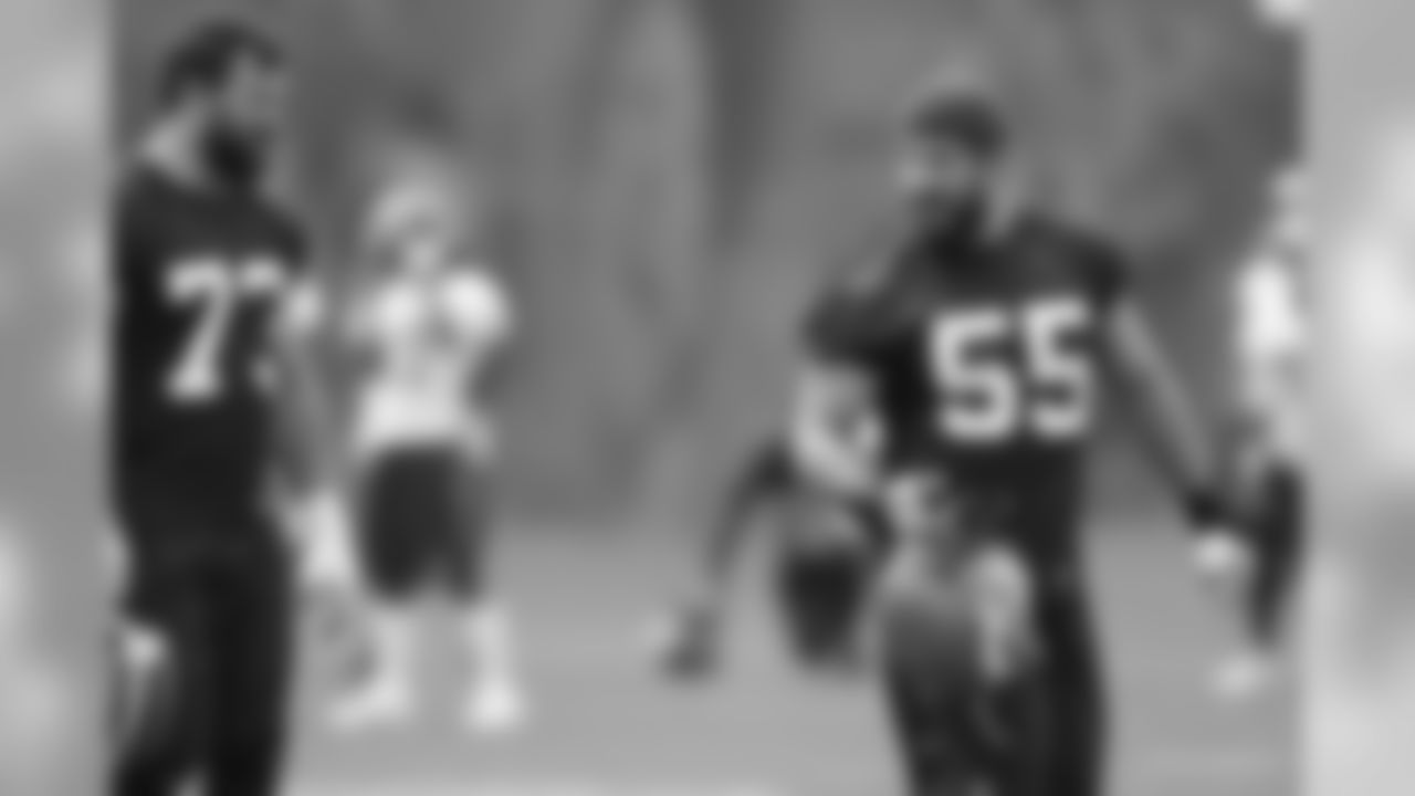 Alex Mack (55) talks to Joe Thomas (73) at the first Browns OTA of 2015.