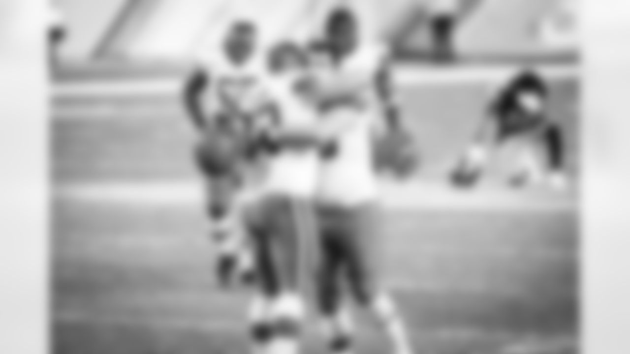 Offensive guard Wyatt Teller (77) and Offensive tackle Michael Dunn (68) after a NFL wild-card playoff football game between the Cleveland Browns and Pittsburgh Steelers on January 10, 2021 at Heinz Field. The Browns won 48-37.