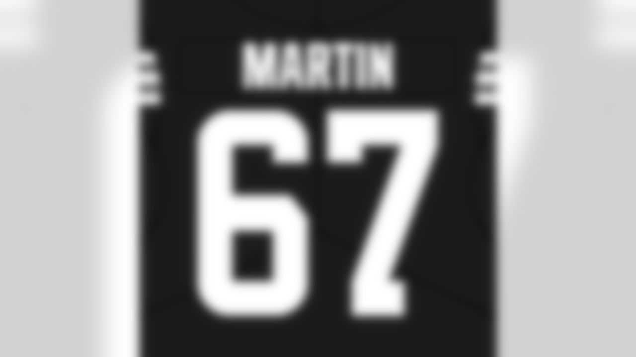 Offensive guard Wes Martin (67)