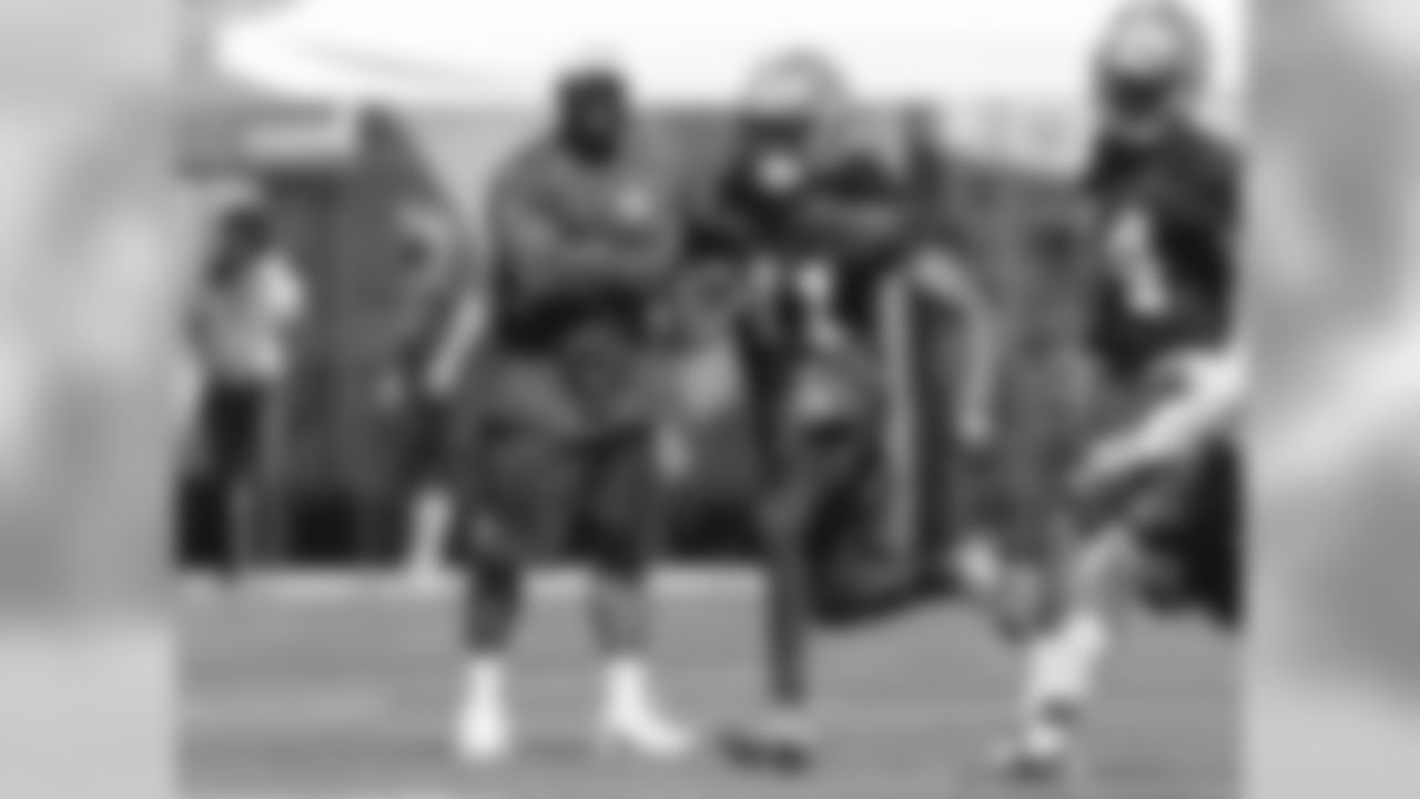 WR Travis Benjamin runs with the ball during drills.