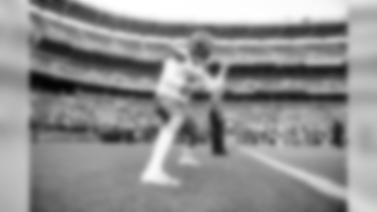Quarterback Baker Mayfield (6) warms up before the Redskins vs. Browns preseason game.
