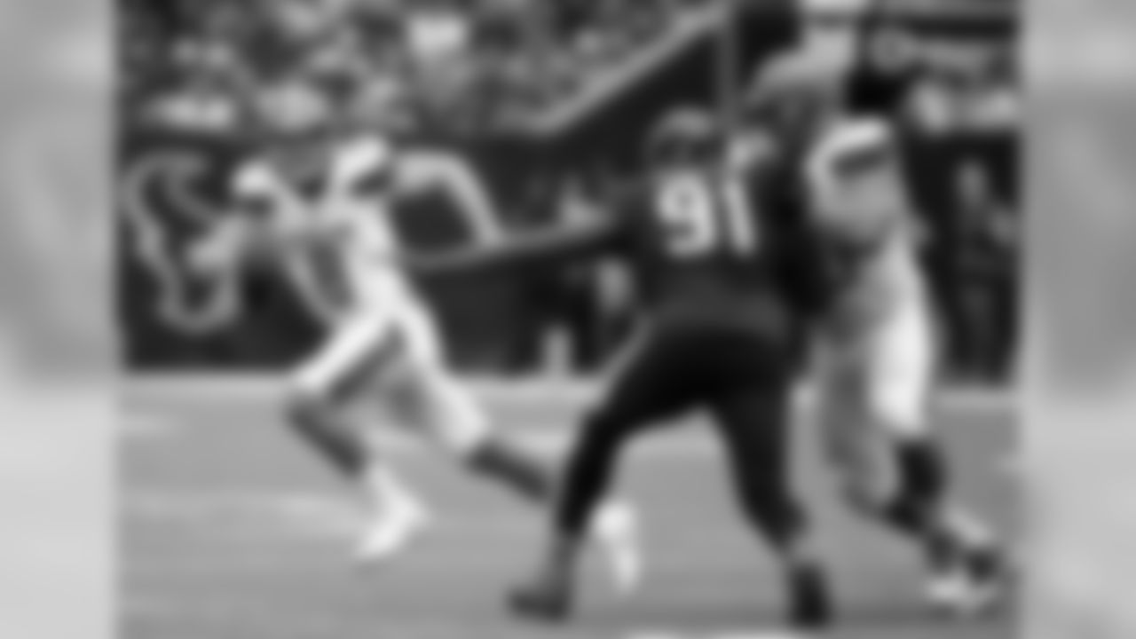QB Kevin Hogan scrambles.