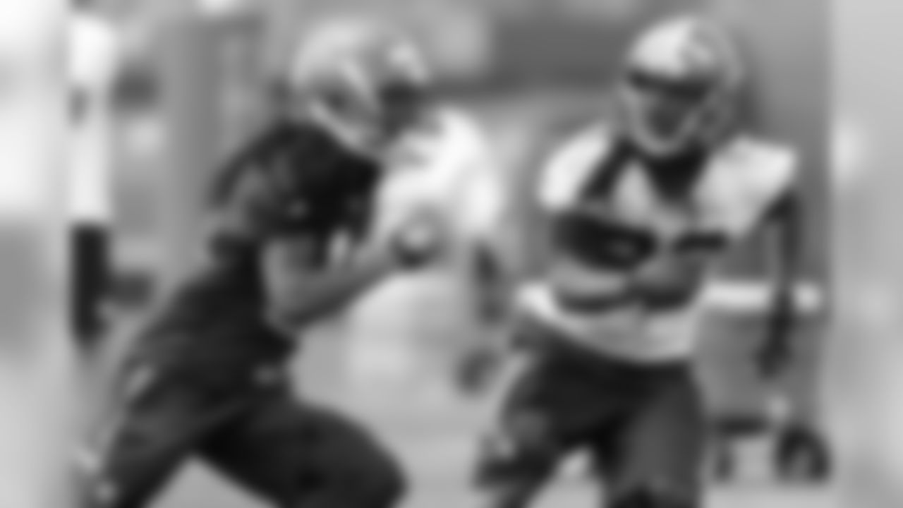 Defensive back Tramon Williams (22) covers wide receiver Travis Benjamin (11).