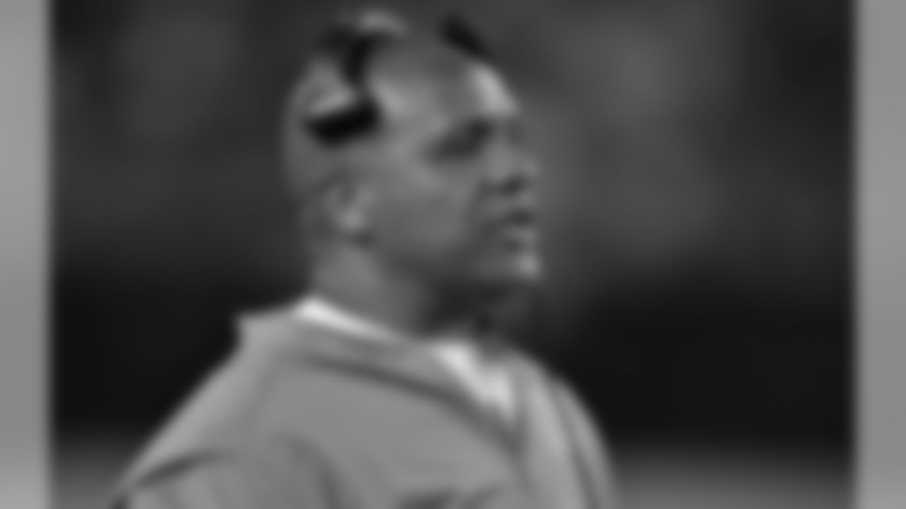 Head coach Hue Jackson watches from the sideline.