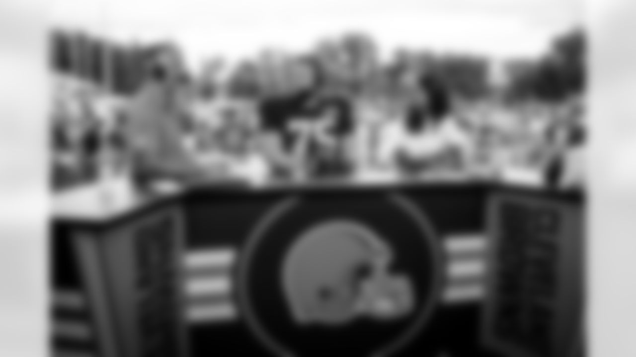 Nathan Zegura, Offensive guard Joel Bitonio (75) and Aditi Kinkhabwala on the Browns Live set during the eleventh day of training camp at CrossCountry Mortgage Campus on August 9, 2022.