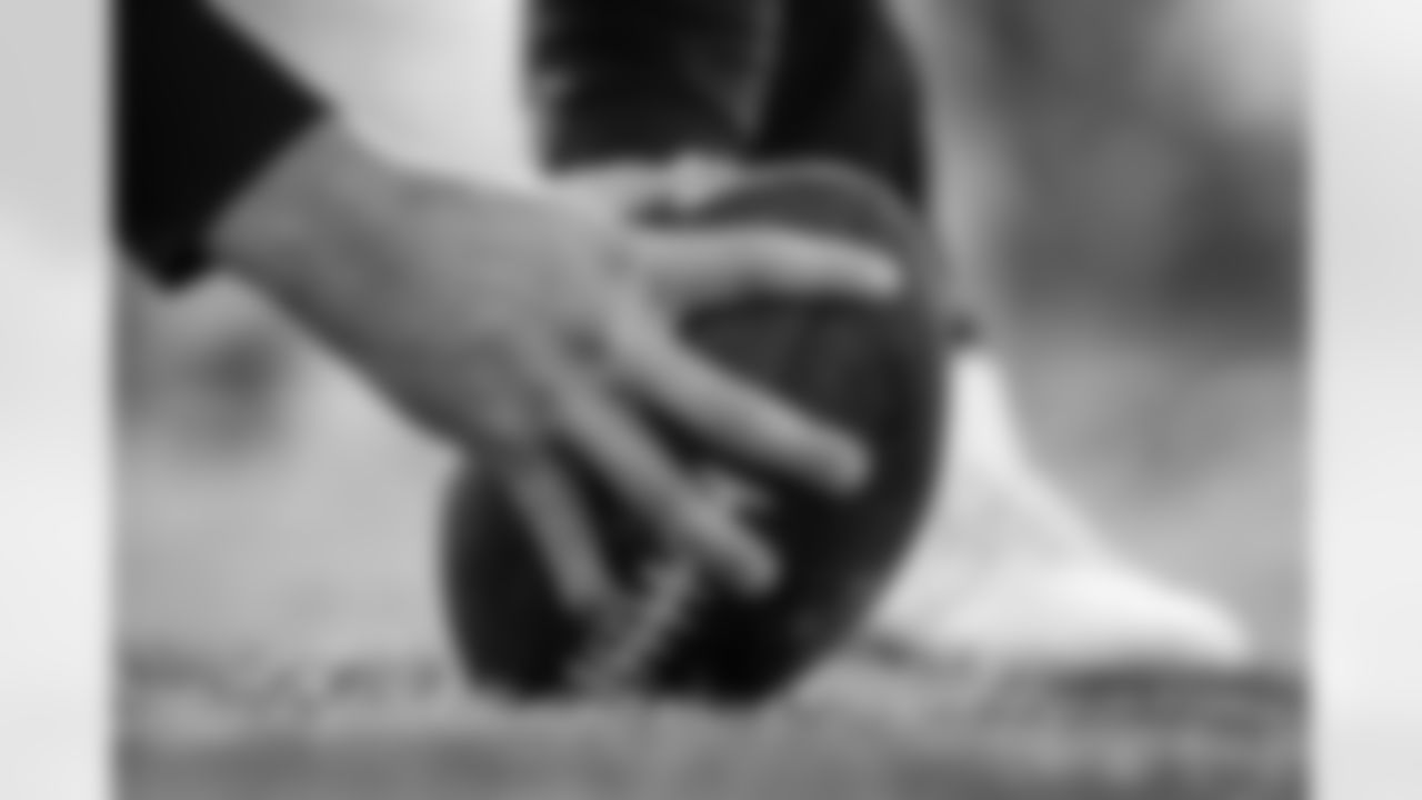 Long snapper Charley Hughlett's hands during practice at CrossCountry Mortgage Campus on December 28, 2022.