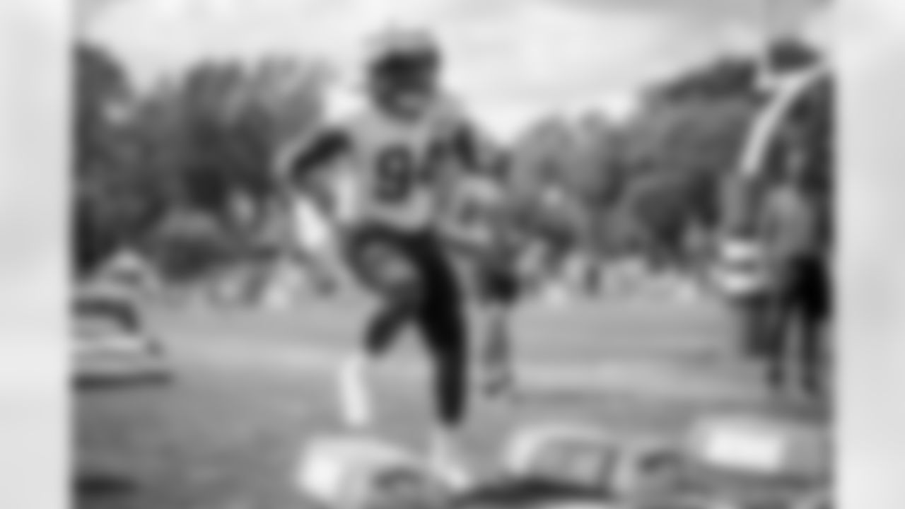Defensive end Alex Wright (94) during the eighth day of training camp at CrossCountry Mortgage Campus on August 5, 2022.