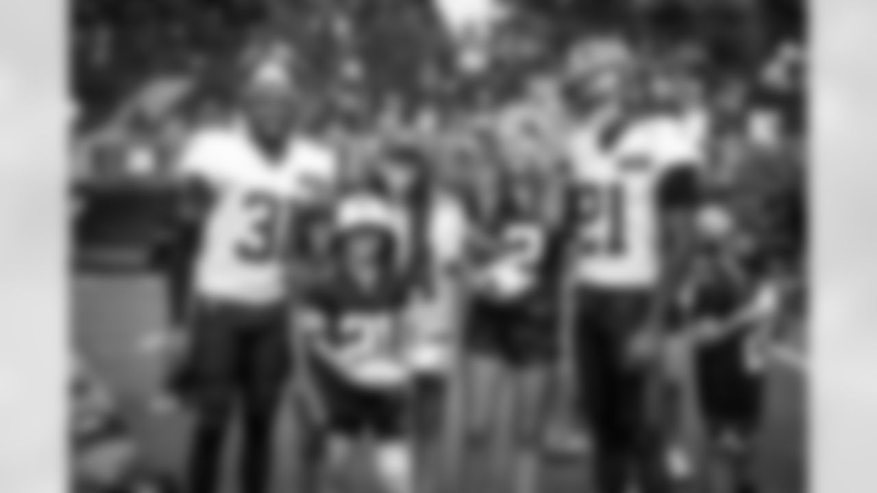 Cornerback Thomas Graham Jr. (31), Cornerback Denzel Ward (21) and fans during Day 7 of Training Camp at CrossCountry Mortgage Campus on August 1, 2023.
