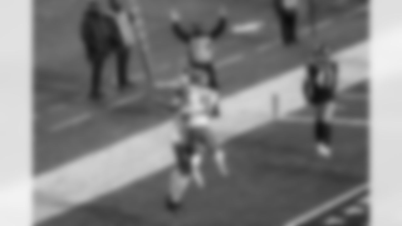 Cleveland Browns tight end Austin Hooper (81) celebrates with Donovan Peoples-Jones (11) after scoring on a 7-yard pass play during the first half of an NFL wild-card playoff football game against the Pittsburgh Steelers, Sunday, Jan. 10, 2021, in Pittsburgh. (AP Photo/Keith Srakocic)