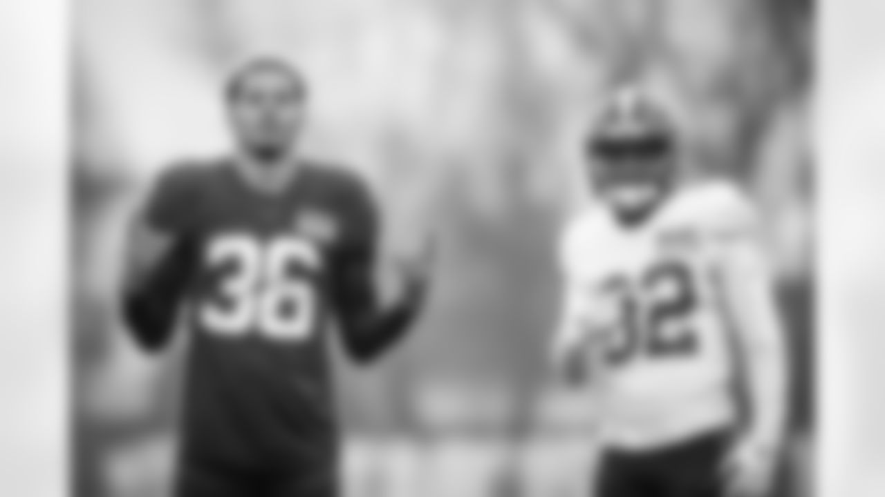 Safety Bubba Bolden (36) and Wide receiver Mike Harley Jr. (82) during practice at CrossCountry Mortgage Campus on December 7, 2022.