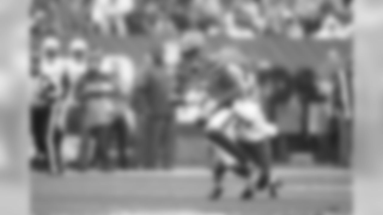 WR Terrelle Pryor Sr. is tackled by New York Jets CB Darrelle Revis.