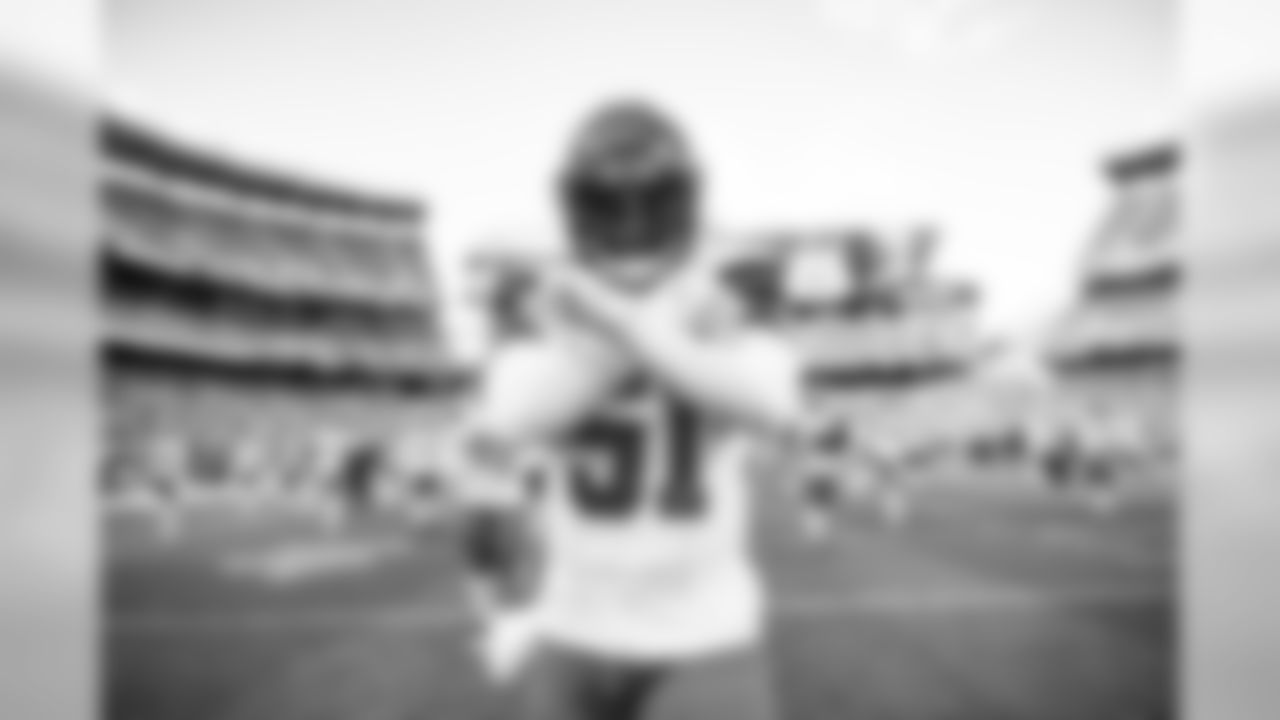 Linebacker Mack Wilson (51) warms up before the Redskins vs. Browns preseason game.