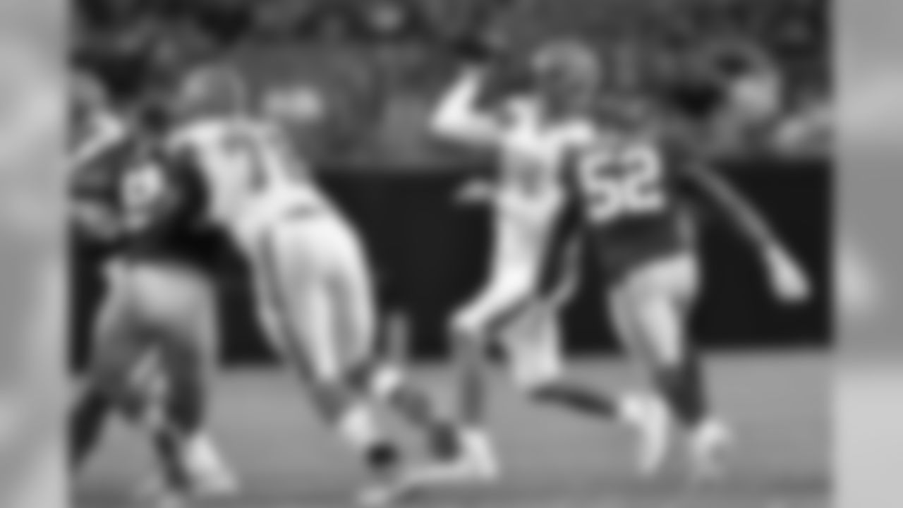 QB Brock Osweiler passes under pressure.