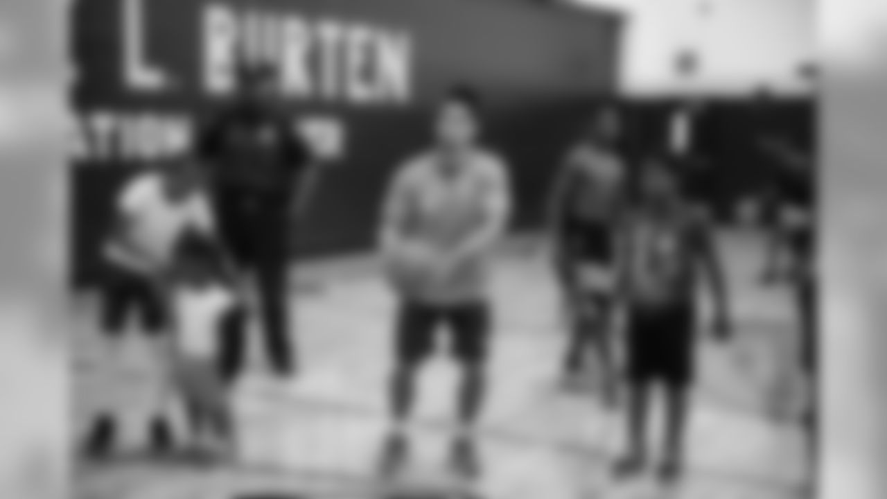 The rookie class visited with youth at Lonnie Burten Recreation Center Monday