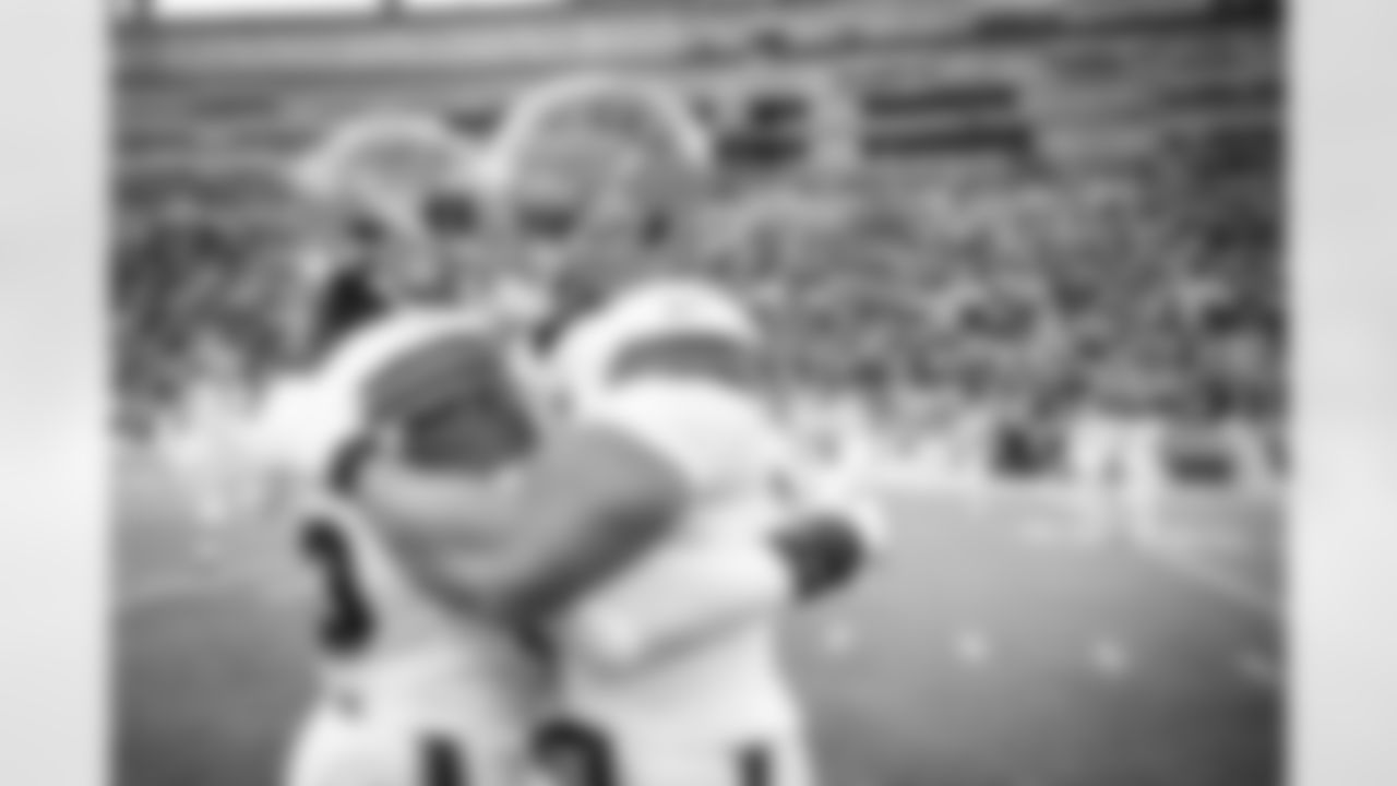 Tight end David Njoku (85) and Defensive end Myles Garrett (95) before a NFL football game between the Cleveland Browns and Green Bay Packers on December 25, 2021 at Lambeau Field. The Browns lost 22-24.