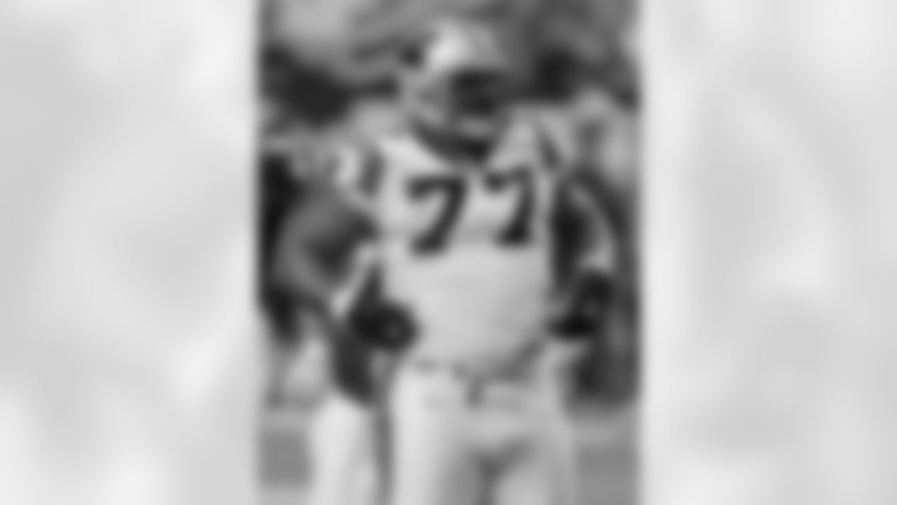 * FILE * Carolina Panthers defensive tackle Kris Jenkins during a football game against the Atlanta Falcons in this Sept. 23, 2007 file photo, in Atlanta. The Carolina Panthers traded three-time Pro Bowl defensive tackle Kris Jenkins to the New York Jets on Friday for third- and fifth-round draft picks. The Jets then came to terms with Jenkins on a new five-year contract worth $35 million, including $20 million in guaranteed money. (AP Photo/John Bazemore, file)