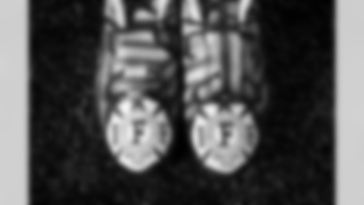 2022 My Cause My Cleats Photoshoot - Defensive end Isaac Rochell (98) - International Association of Firefighters Cleveland Branch