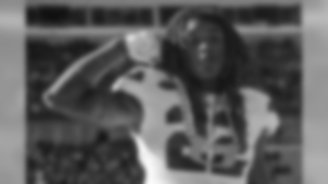 Miami defensive back Sheldrick Redwine (22) shows off their "U" turnover chain after recovering a fumble against Pittsburgh in an NCAA college football game, Friday, Nov. 24, 2017, in Pittsburgh. (AP Photo/Keith Srakocic)