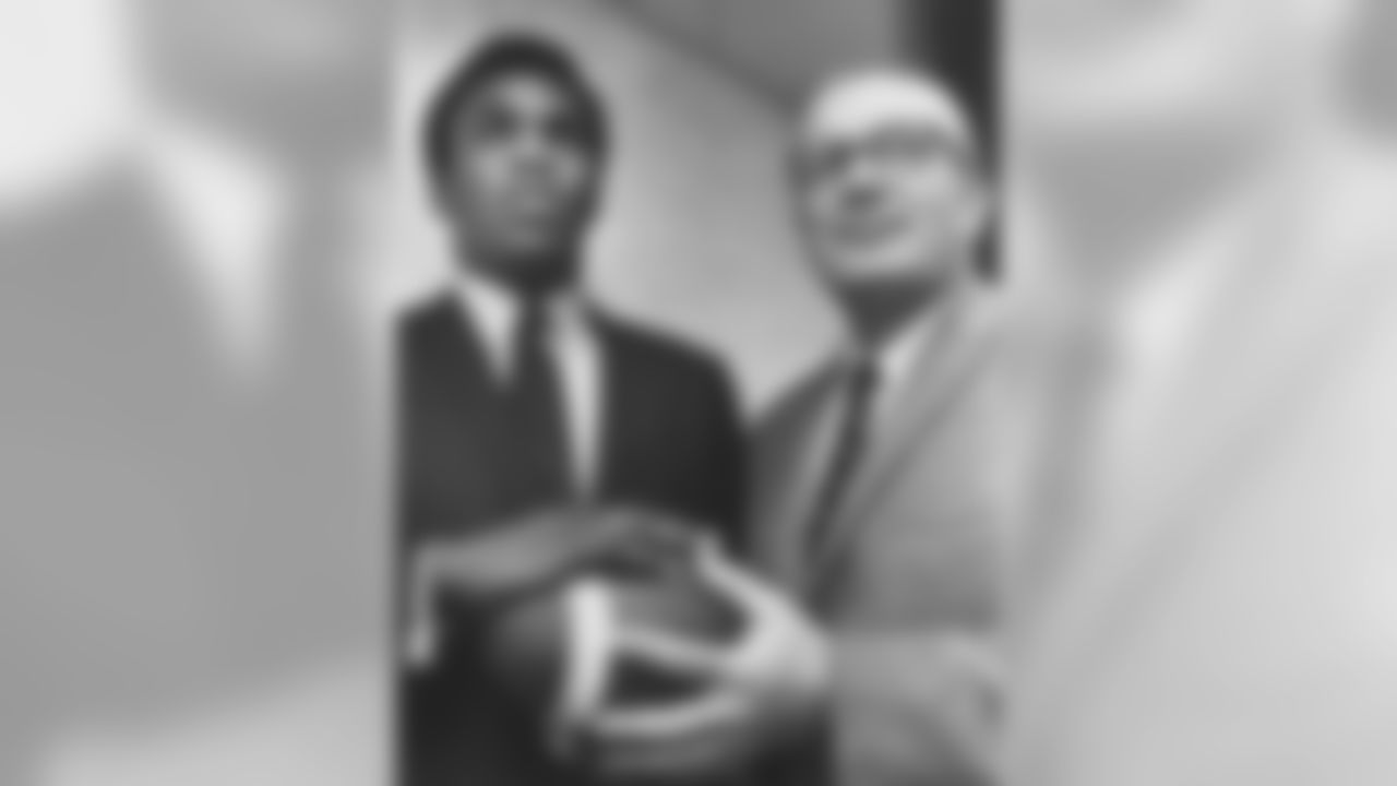 Rookie Ron Johnson, seen here with Blanton Collier saved the day rushing for 118 yards in relief of Leroy Kelly.