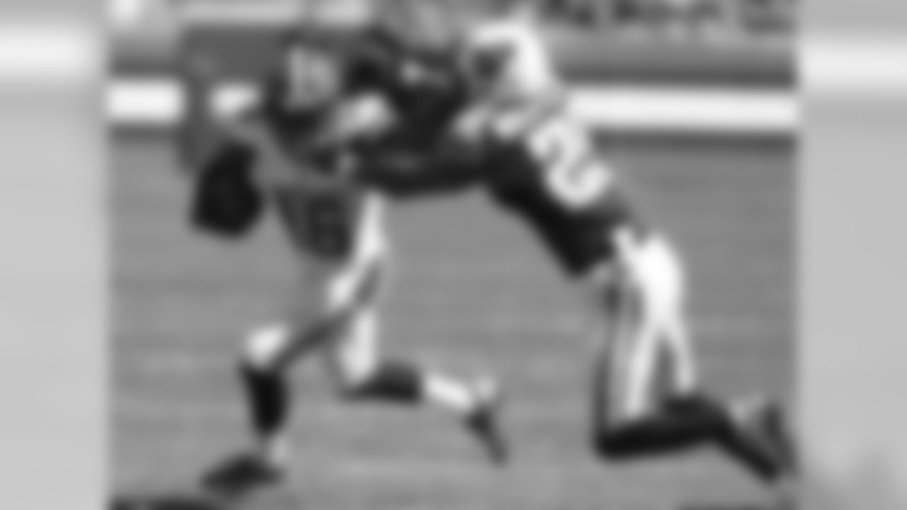 Cleveland Browns wide receiver Andrew Hawkins (16) tries to get past Tennessee Titans cornerback Blidi Wreh-Wilson (25) after a pass reception