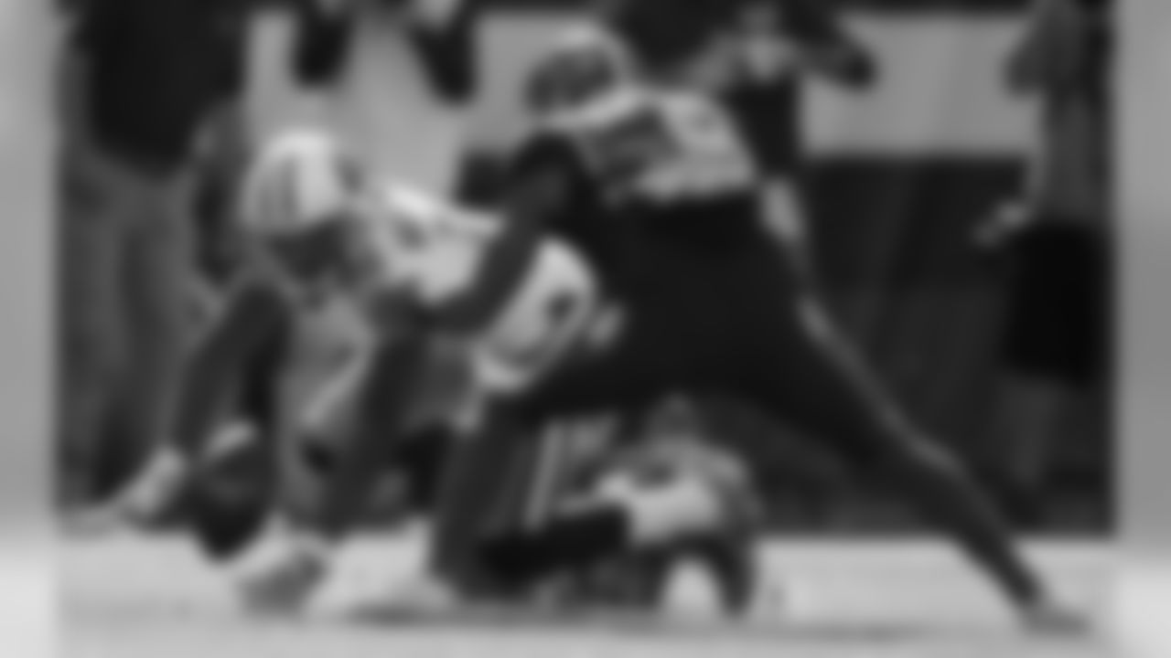 LB Christian Kirksey pressures Titans WR Rishard Matthews.