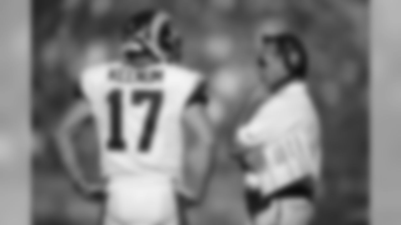 Los Angeles Rams head coach Jeff Fisher talks with quarterback Case Keenum, right, during the second half of an NFL football game against the Buffalo Bills Sunday, Oct. 9, 2016, in Los Angeles. (AP Photo/Kelvin Kuo)