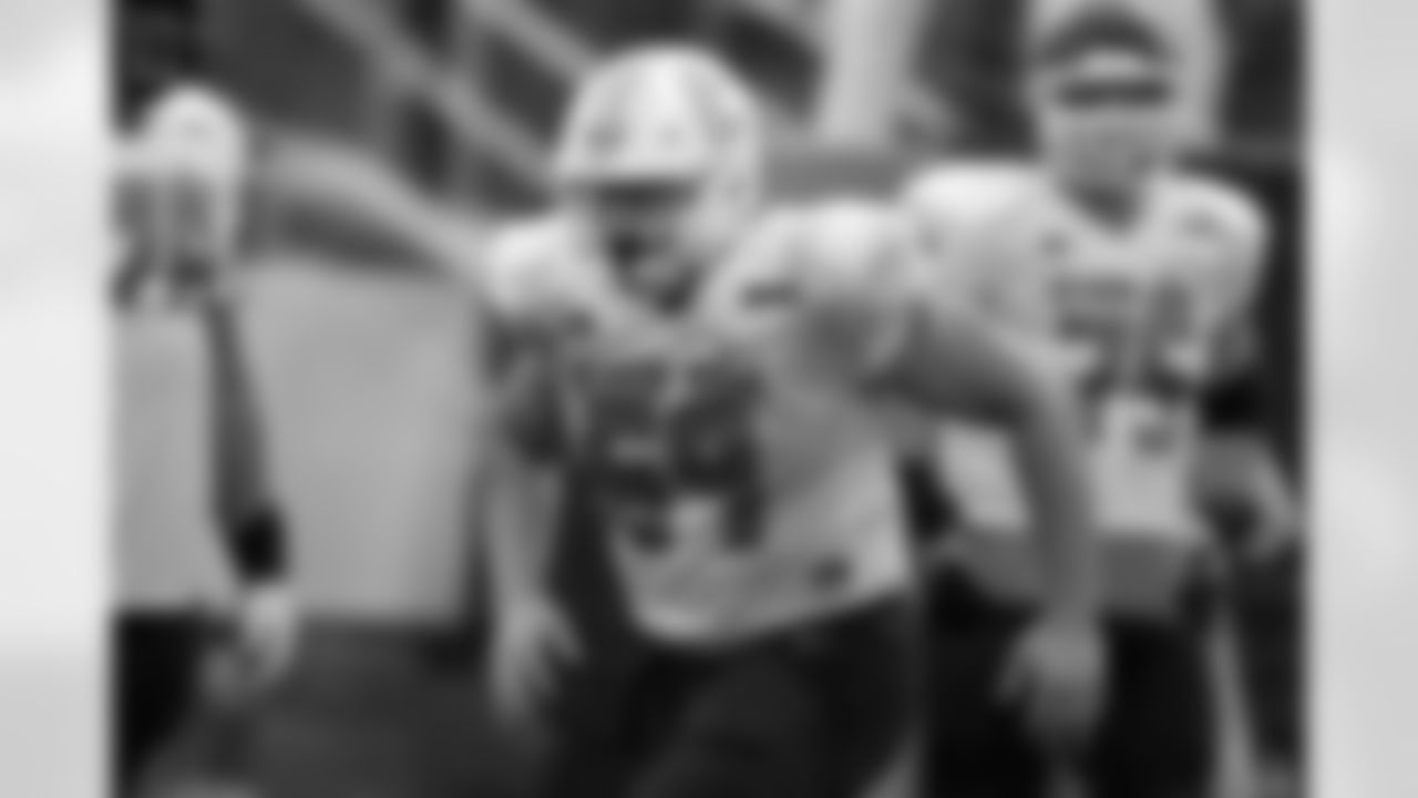 National Team offensive lineman Cole Strange of UT-Chattanooga runs through drills during practice for the Senior Bowl NCAA college football game Wednesday, Feb. 2, 2022, in Mobile, Ala. (AP Photo/Butch Dill)