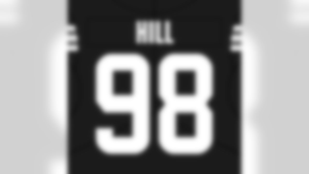 Defensive tackle Trysten Hill (98)
