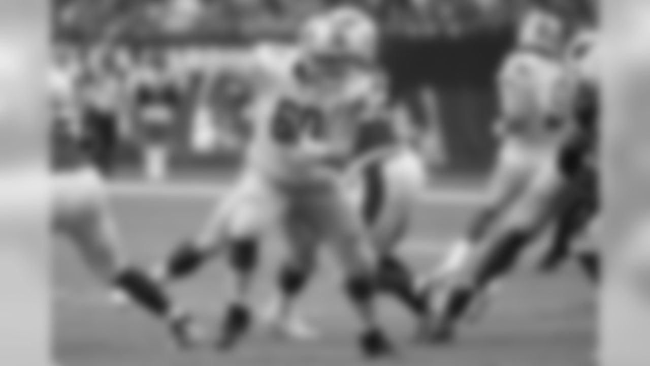 Detroit Lions center Graham Glasgow (60) runs a play against the Arizona Cardinals during the first half of an NFL football game, Sunday, Sept. 8, 2019, in Glendale, Ariz. (AP Photo/Rick Scuteri)