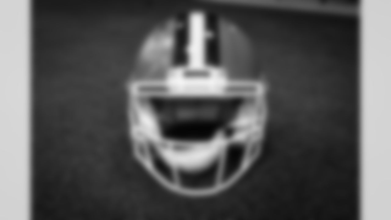 White facemask locker room setup at FirstEnergy Stadium on December 13, 2022.