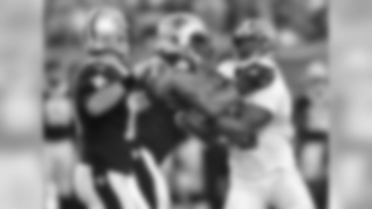 DL Myles Garrett hurries New Orleans Saints QB Chase Daniel.