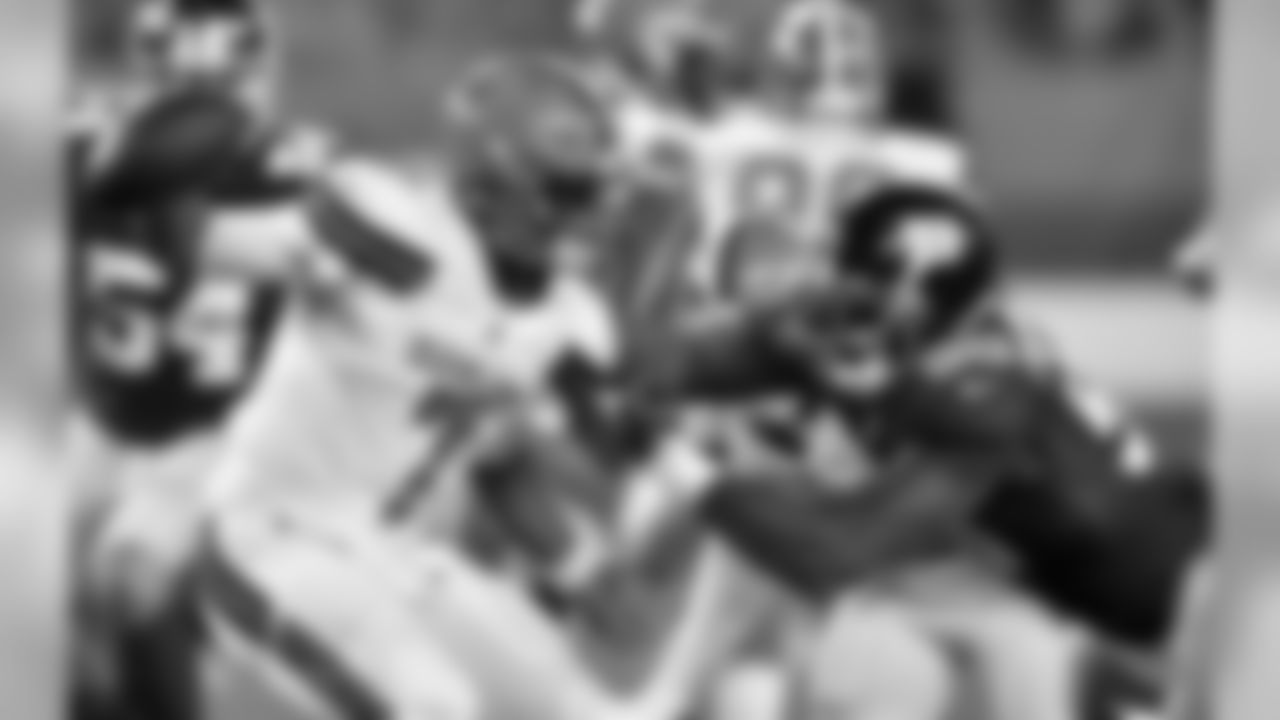 QB DeShone Kizer is pressured by Giants DE Jason Pierre-Paul.
