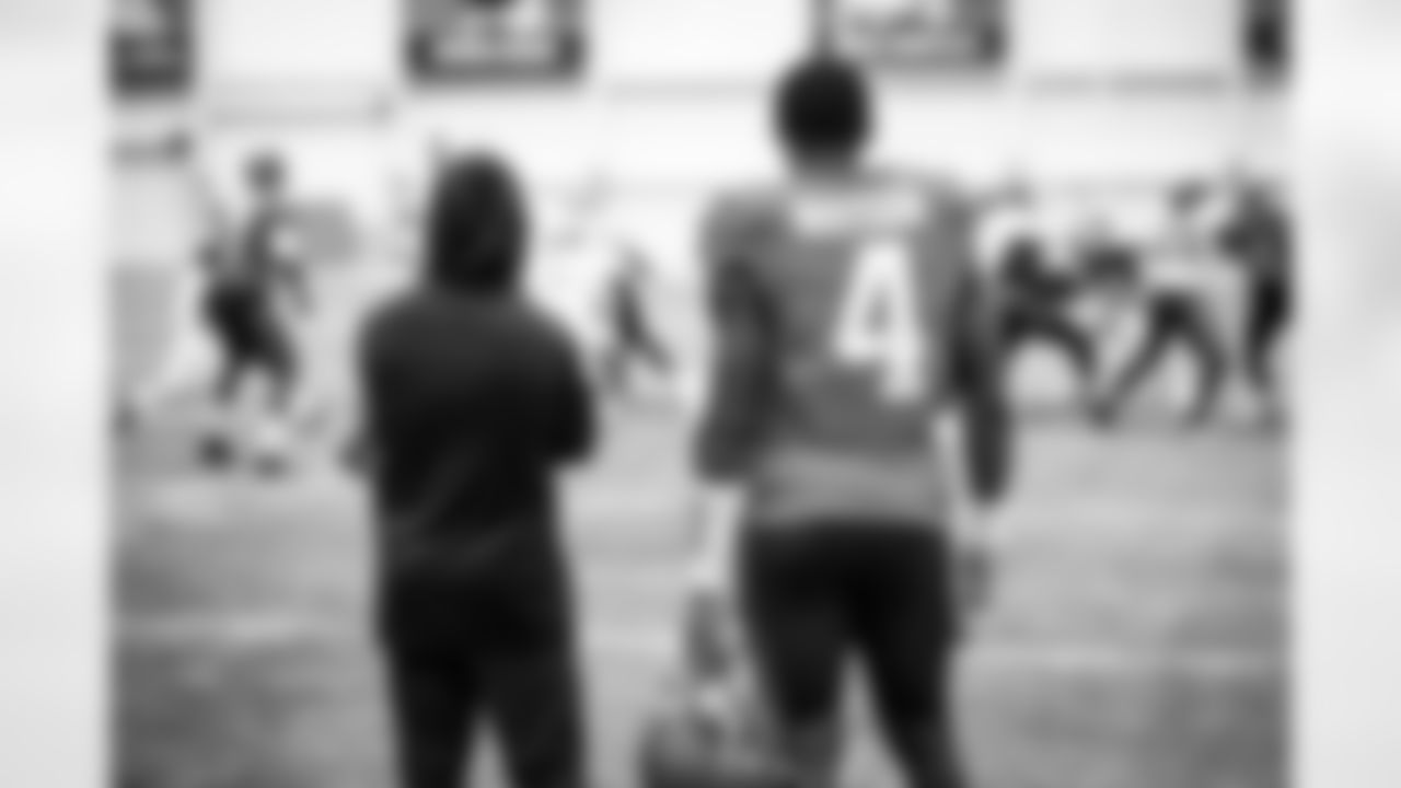 Quarterback Coach Drew Petzing and Quarterback Deshaun Watson (4) during practice at CrossCountry Mortgage Campus on November 30, 2022.