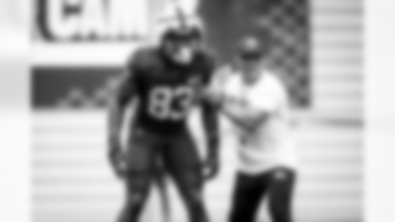 Tight end Zaire Mitchell-Paden (83) and Assistant Head Coach/Special Teams Coordinator Bubba Ventrone during Day 7 of Training Camp at CrossCountry Mortgage Campus on August 1, 2023.