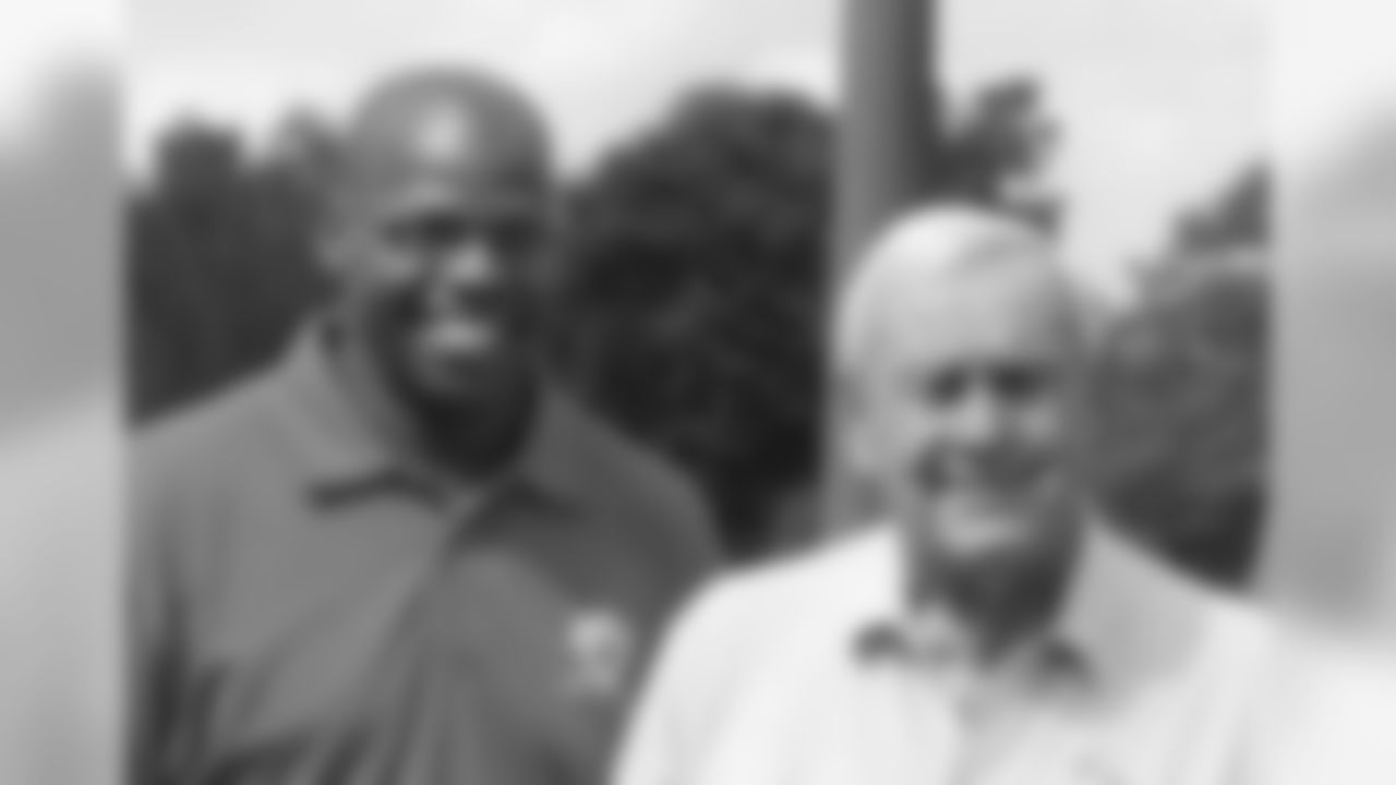 Kevin Mack and Arnold Palmer