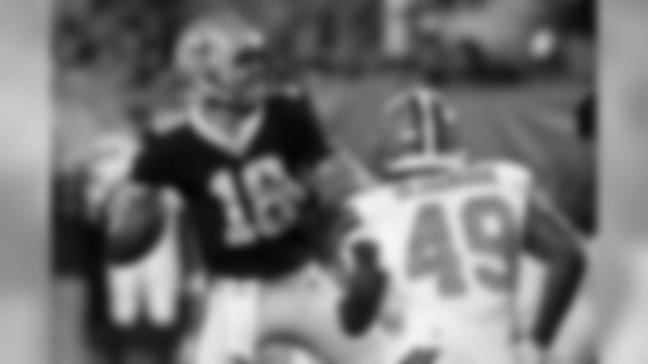 LB Kenneth Olugbode pressures New Orleans Saints QB Garrett Grayson.