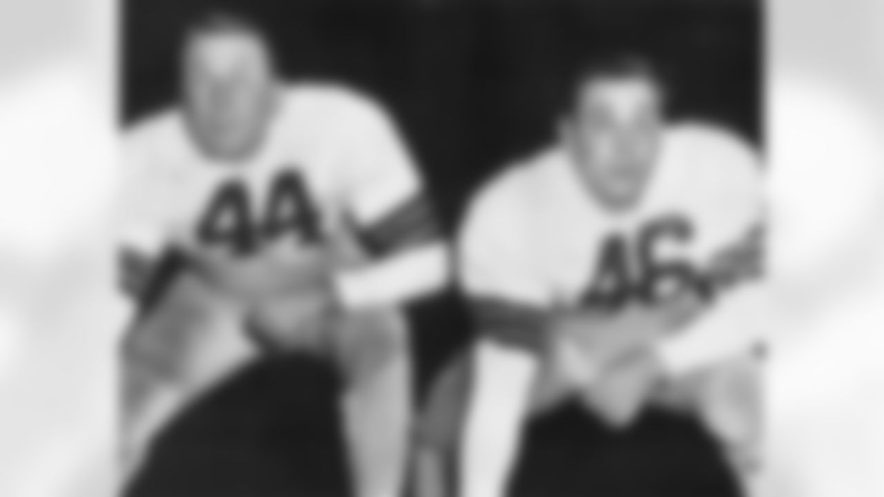 Offensive tackles Lou Rymkus and Lou Groza anchored the offensive line for the Browns.