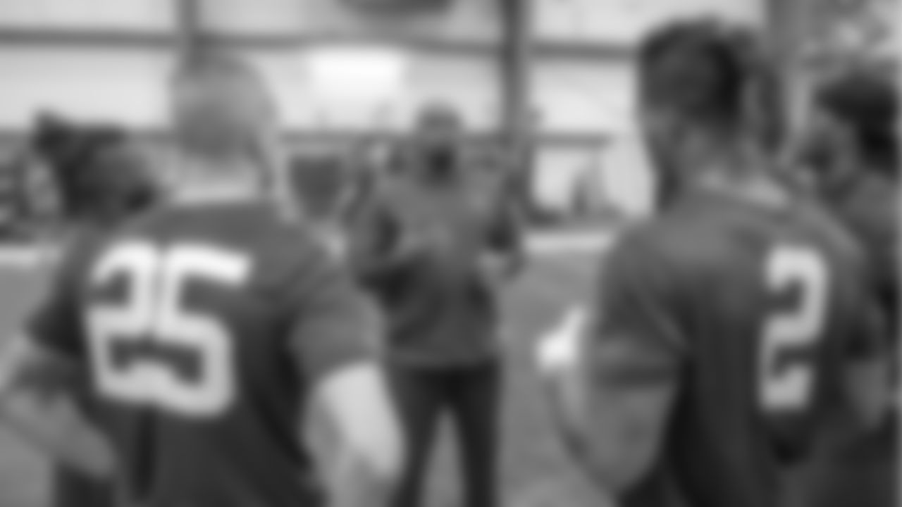 Browns receivers coach Adam Henry instructs local prospects during the team's local pro day Friday in Berea.