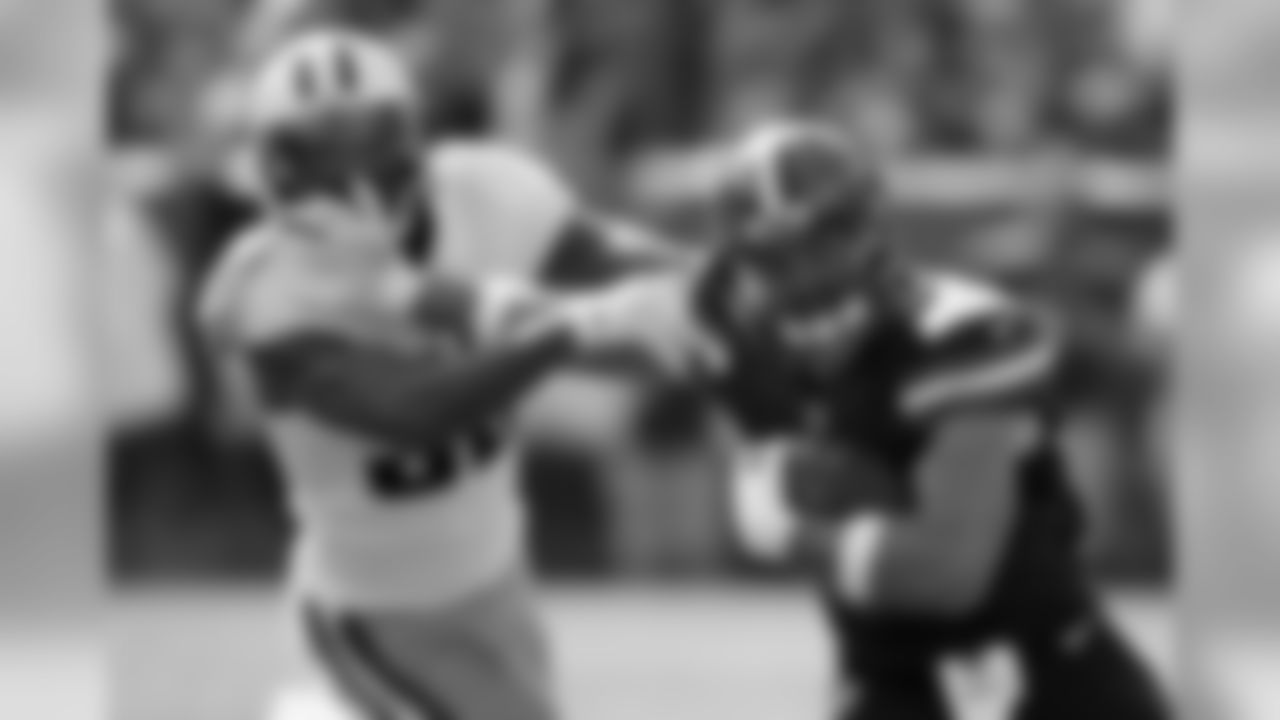 TE Seth DeValve runs against Titans LB Wesley Woodyard.