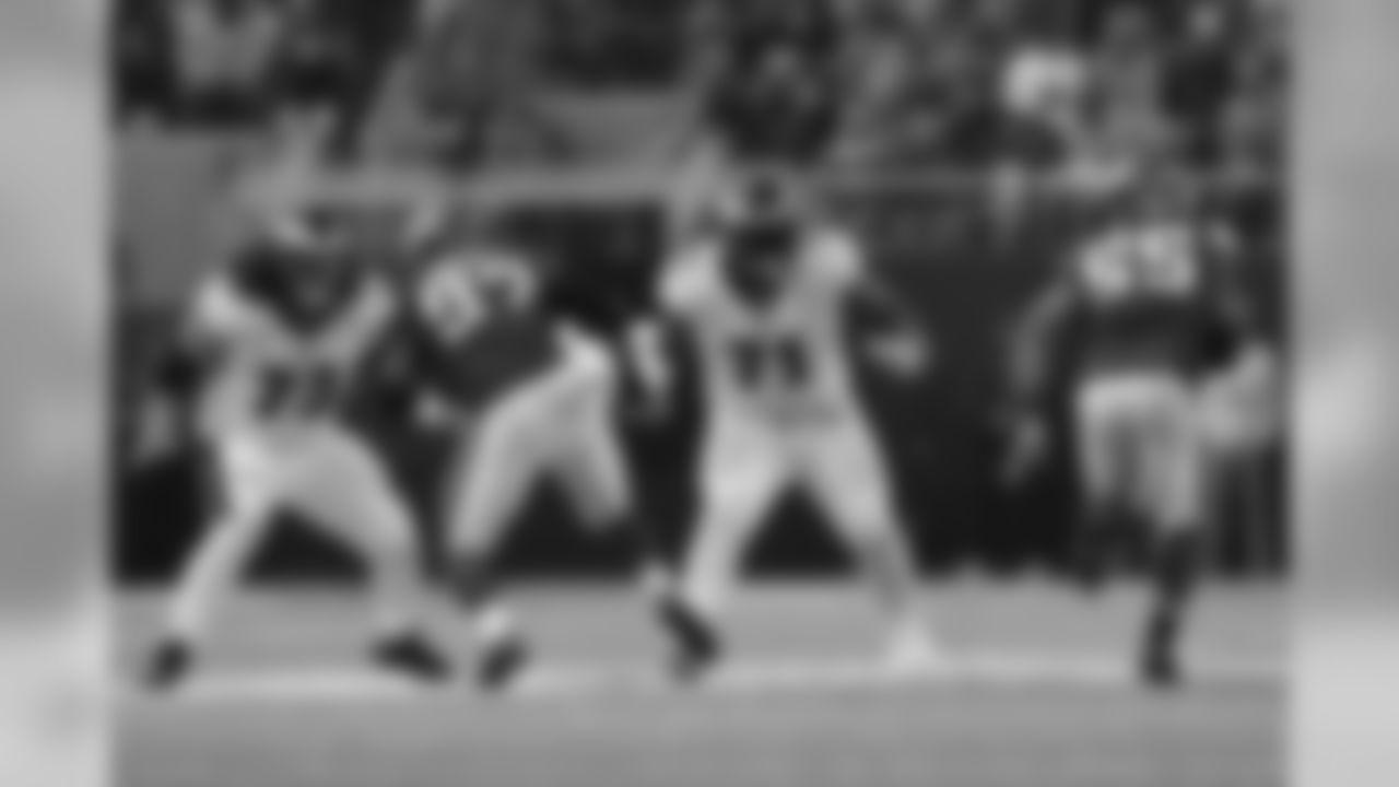 Philadelphia Eagles offensive guard Isaac Seumalo (73) and offensive tackle Jason Peters (71) blocks Minnesota Vikings defensive end Everson Griffen (97) and outside linebacker Anthony Barr (55) during an NFL football game, Sunday, Oct. 13, 2019, in Minneapolis. Minnesota won 38-20. (Aaron M. Sprecher via AP)