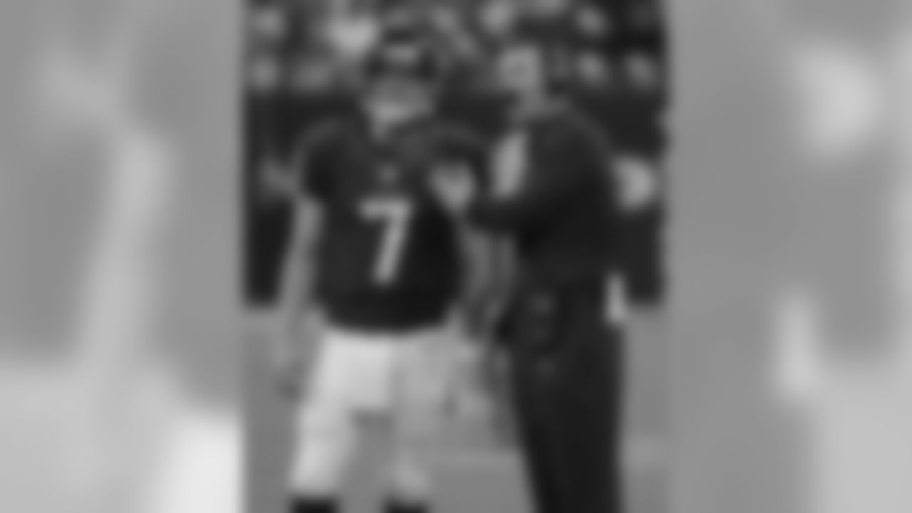 Houston Texans head coach Gary Kubiak, right, talks with rookie quarterback Case Keenum (7) in the fourth quarter an NFL preseason football game against the San Francisco 49ers, Saturday, Aug. 18, 2012, in Houston. The Texans beat the 49ers 20-9. (AP Photo/Dave Einsel)