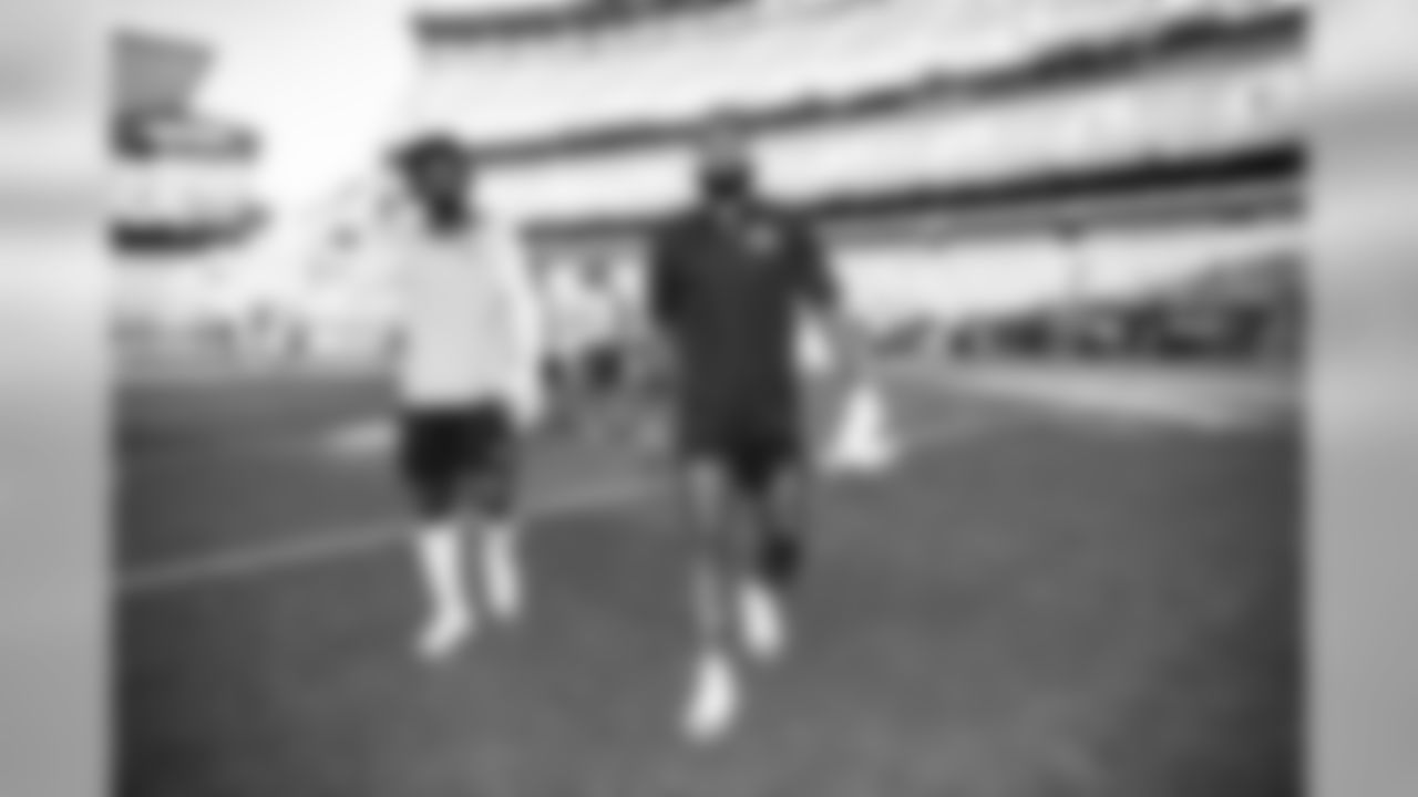 Wide receivers Jarvis Landry (80, left) and Odell Beckham Jr. (13, right) warm up before the Redskins vs. Browns preseason game.