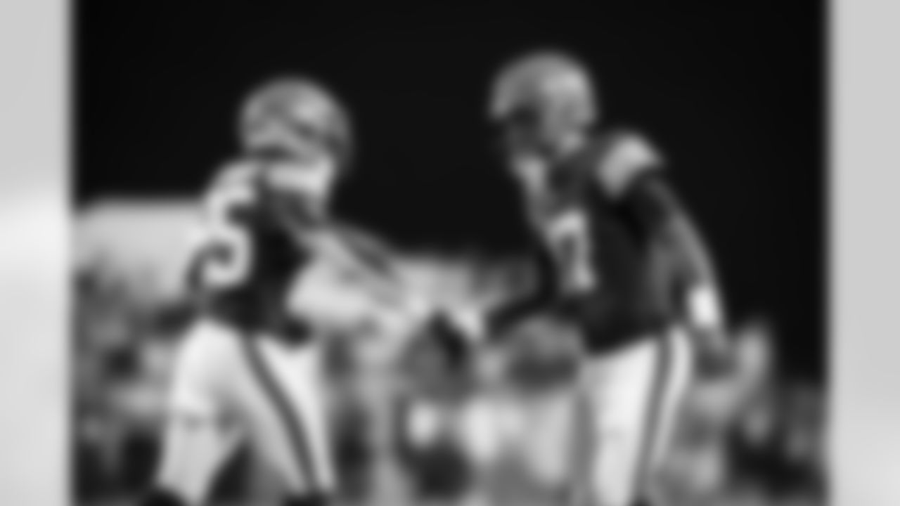 Running back Demetric Felton Jr. (25) and Quarterback Dorian Thompson-Robinson (17) during the Hall of Fame Game between the New York Jets and Cleveland Browns on August 3, 2023 at Tom Benson Hall of Fame Stadium.