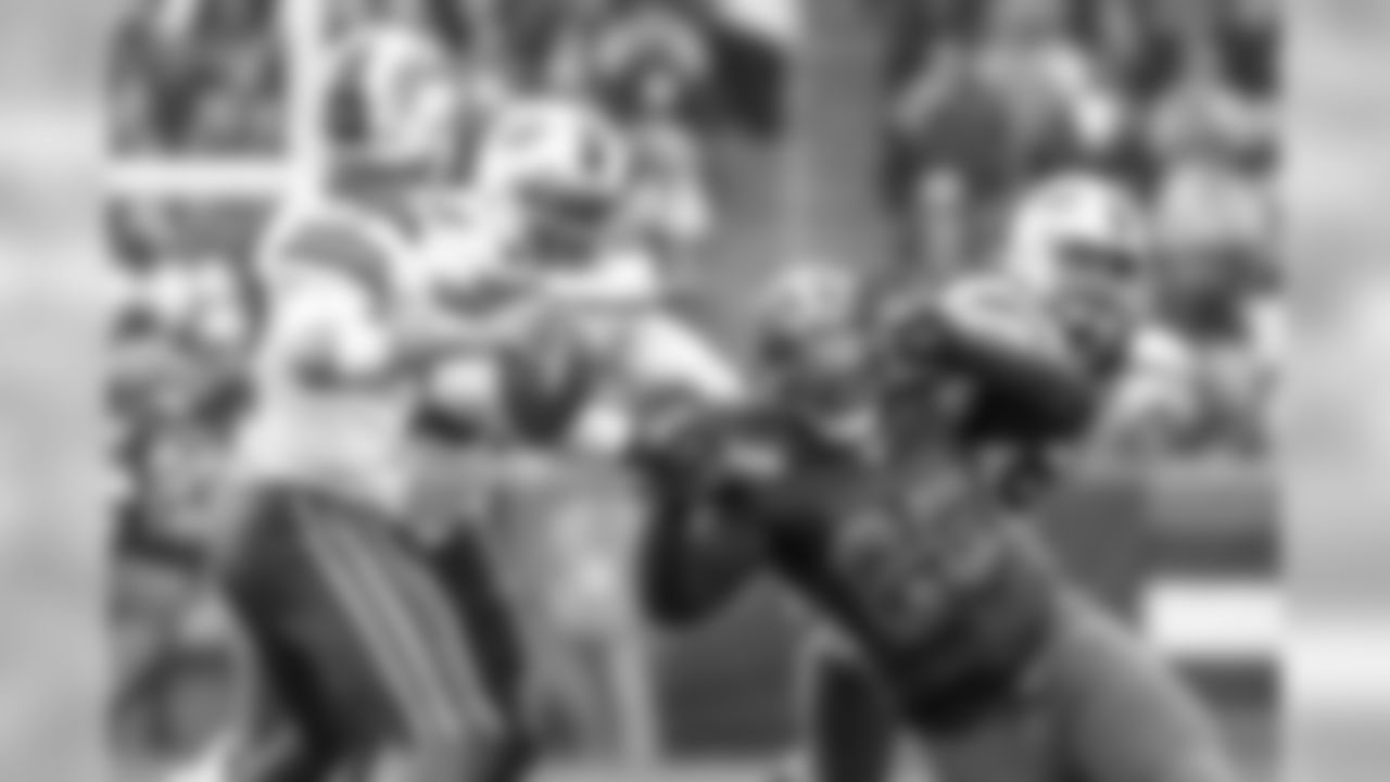 Defensive tackle Larry Ogunjobi (65)