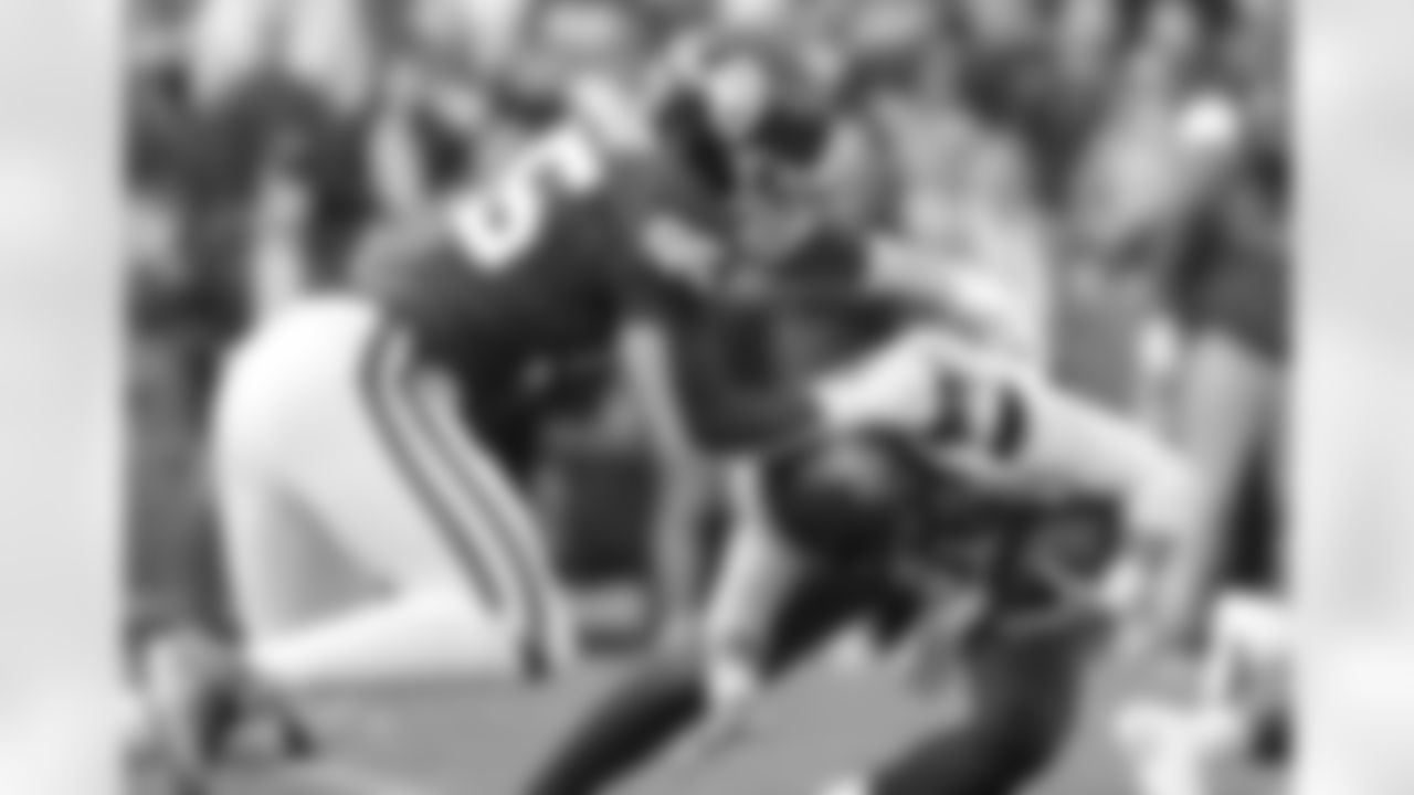 Oklahoma defensive lineman Isaiah Thomas (95) tackles Iowa State quarterback Brock Purdy (15) during the first half of an NCAA college football game Saturday, Nov. 20, 2021, in Norman, Okla. (AP Photo/Alonzo Adams)