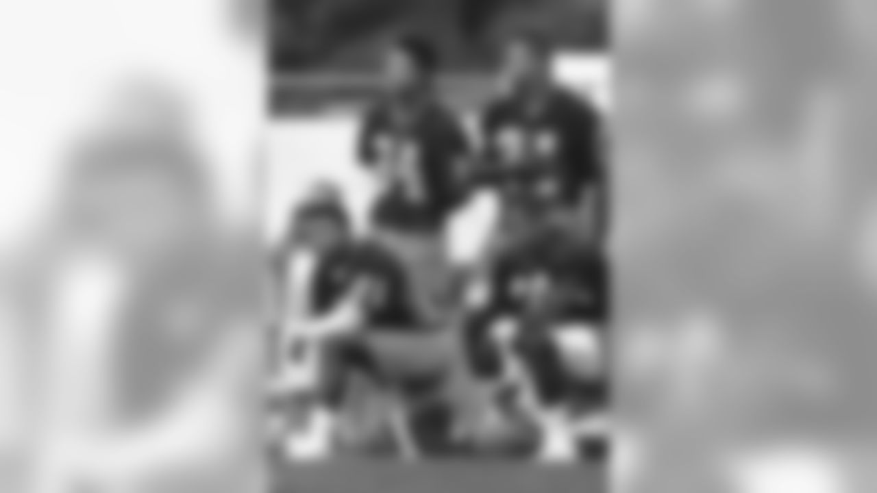 Eric Metcalf, Joe Morris, Webster Slaughter and Kevin Mack take a break during training camp in 1991.