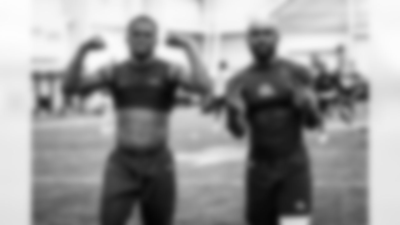 Wide receiver Mike Harley Jr. (82) and Wide receiver Elijah Moore (8) during a workout in Phase I of the offseason at CrossCountry Mortgage Campus on April 20, 2023.