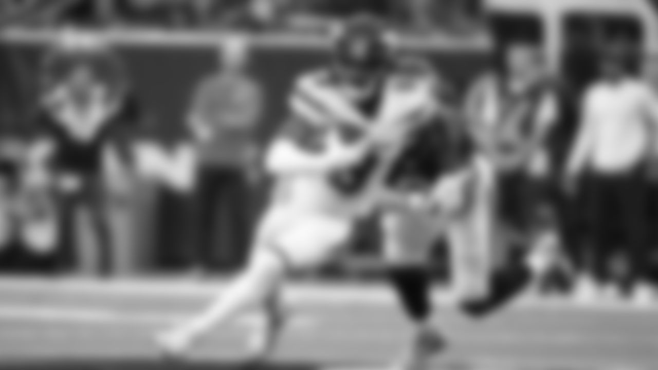 New York Jets wide receiver Elijah Moore (8) carries against in the second half of an NFL football game in Houston, Sunday, Nov. 28, 2021.