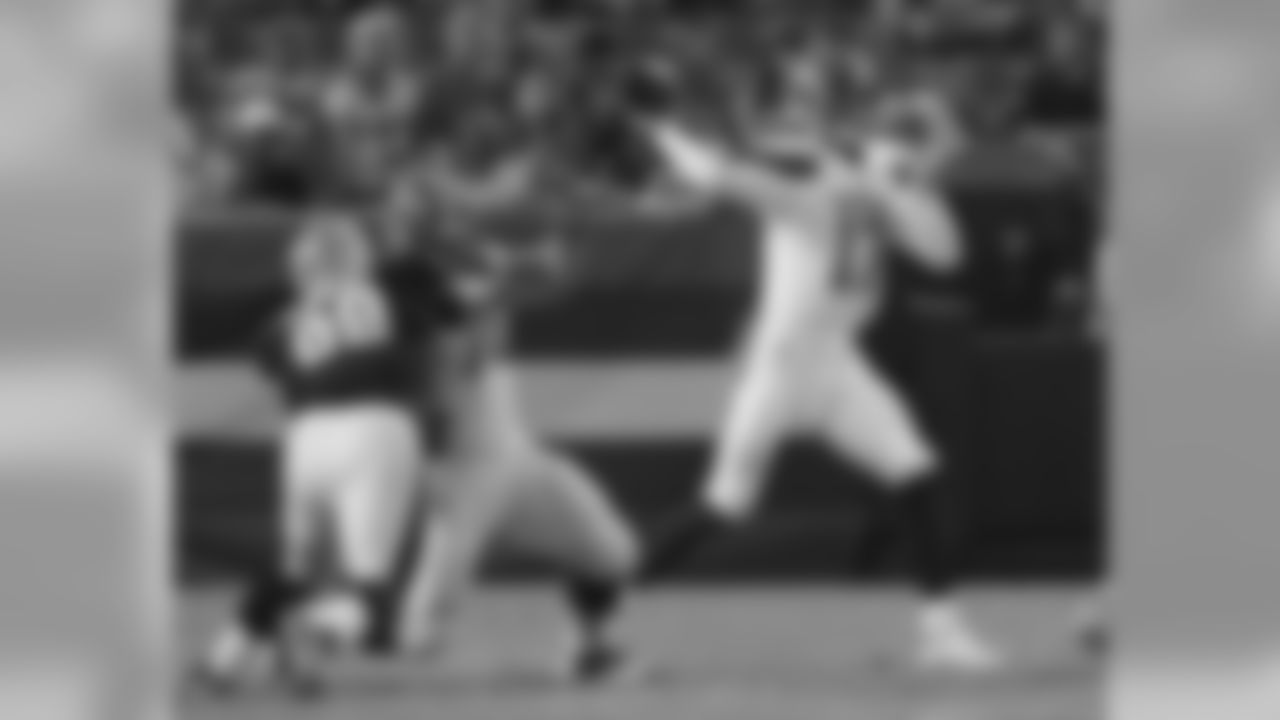 QB Brock Osweiler passes the ball.