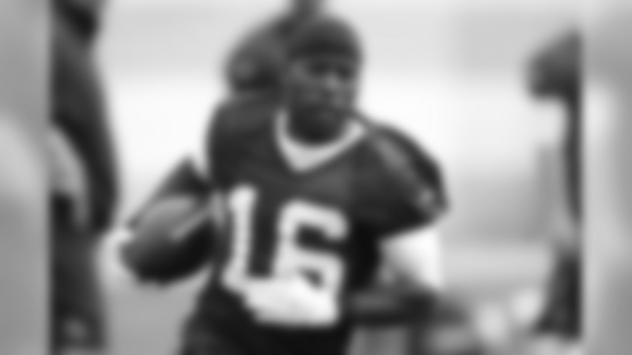 Wide receiver Andrew Hawkins runs with the ball during the first Browns OTA of the 2015 season.